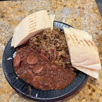 Gumbo Ya Ya signature dishes Red Beans With Smoked Sausage 
Chicken Creole
Traditional Jambalaya